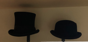 One of my husband's current art projects is setting up some of our many hats in displays around the new house. These are the hats we wore the day we were married. And yeah, I get that lump in my throat and tear up every time I look up at them. Tears of joy.